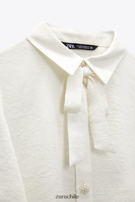 ropa cl Zara mujer camisa con cuello con lazo y botones de perlas crudo JJ06N4381
